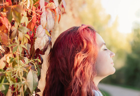 Relaxed young woman with red hair on an autumn day 2025 01 08 04 39 16 utc 1 1