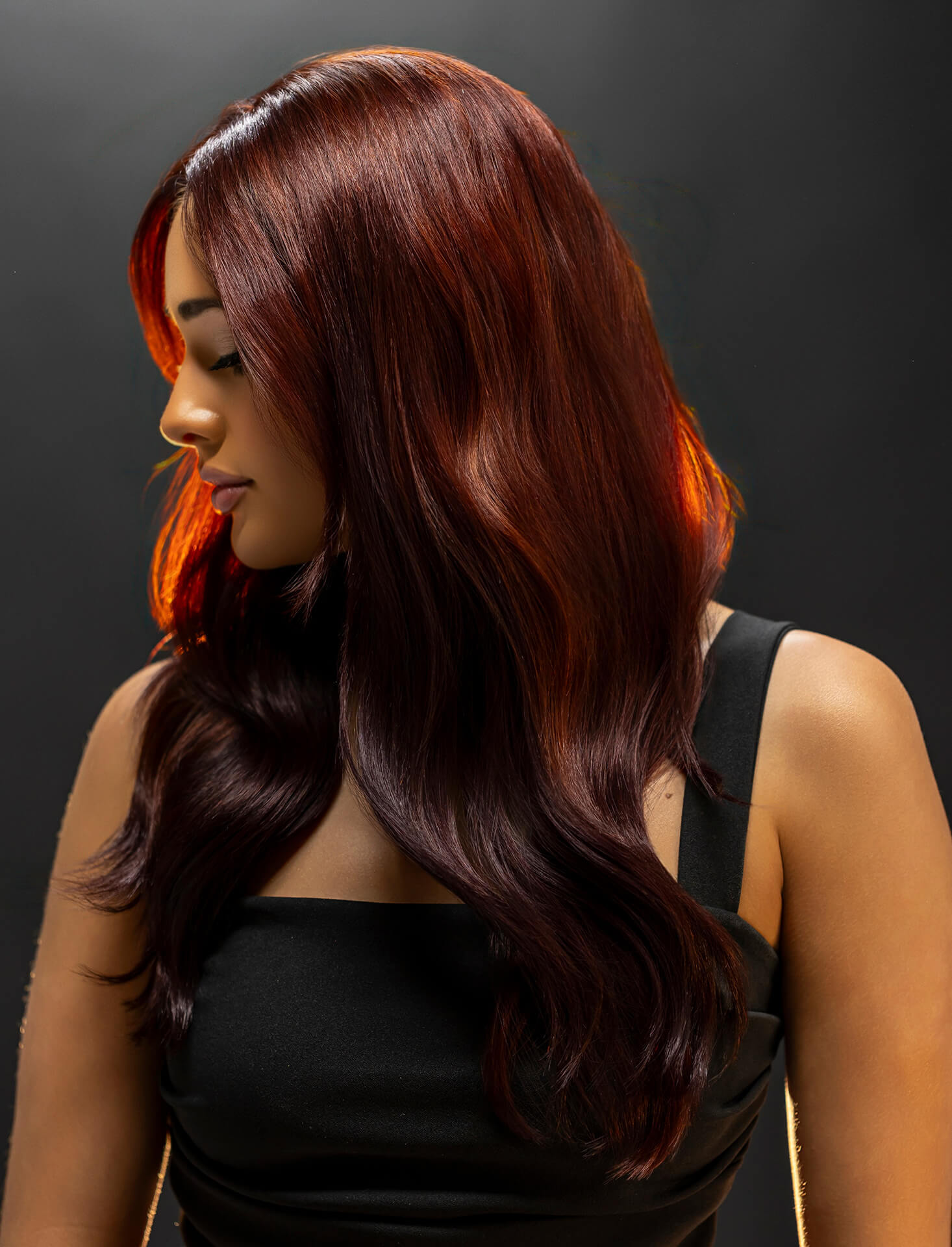 Bronzite, a deep, intense bronze-brown hair colour with muted bronze-red undertones, made by Directions Hair Colour