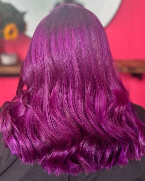 A photo demonstrating what can happen if you put purple hair dye directly over red hair, using Directions purple hair dye